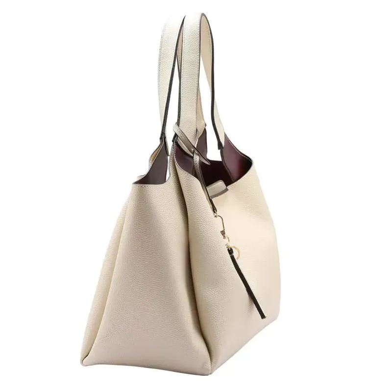 kit_bolsa_feminina_necessaire_chenson_original_casual_chic_mao_3485006_7221_variacao_22177_2_2663615e34a679ce614791d36883b289--1-.webp